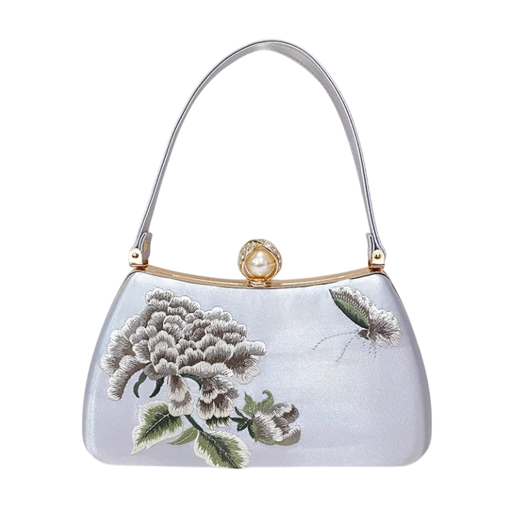 Enchanted Blossom: A Luxurious Handbag Embroidered with Floral Elegance and Abundant Charm